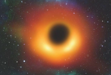 天文学家在早期宇宙的阴影中发现了一个极其红色的超大质量黑洞
